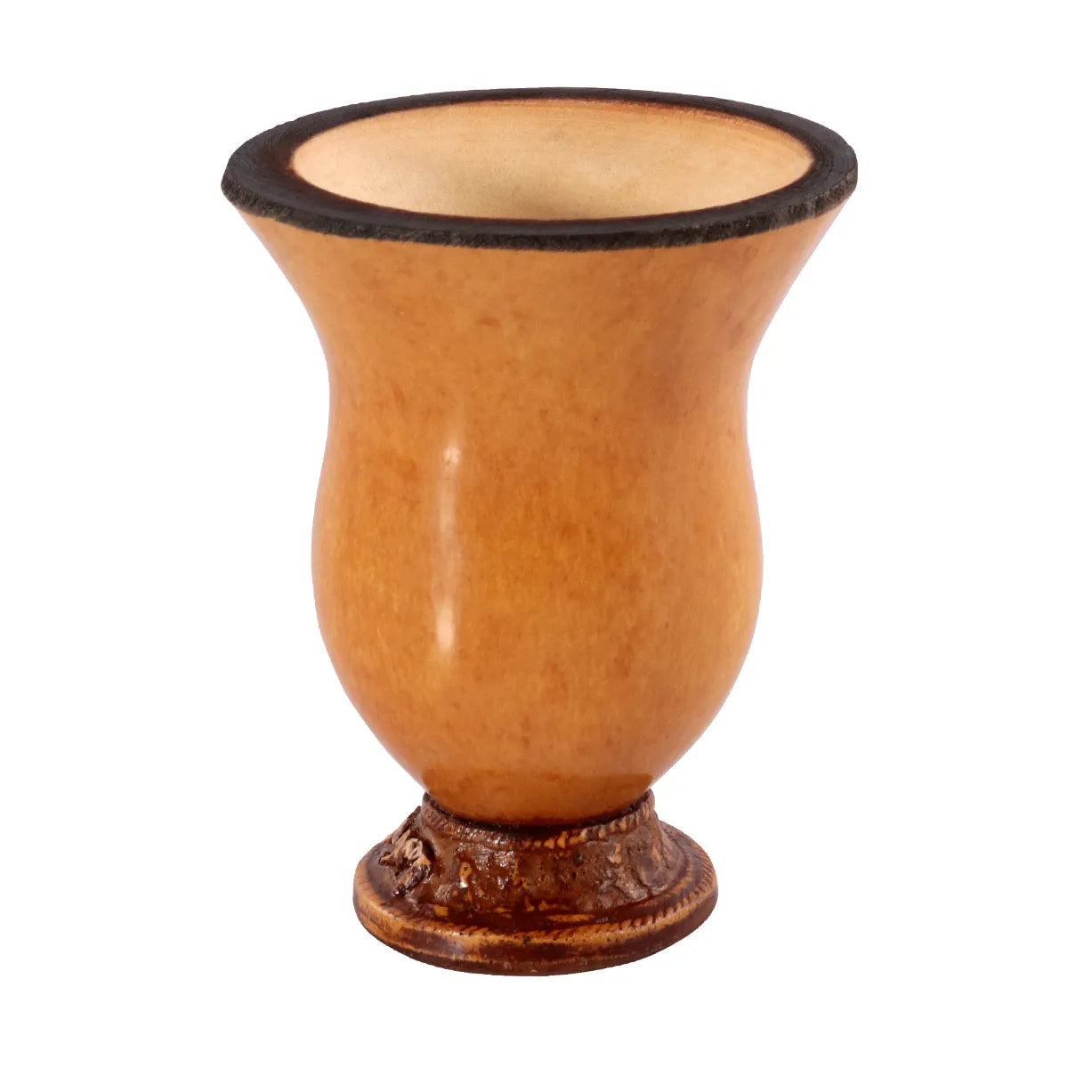 A traditional handmade gourd cuia, with a beige tone and decorative patterns at the base, displayed on a wooden surface with white background.