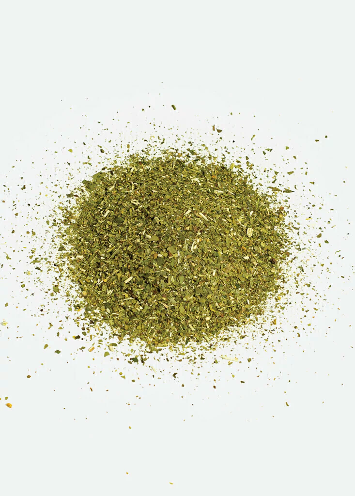 A photo of loose leaf yerba mate on a white background.