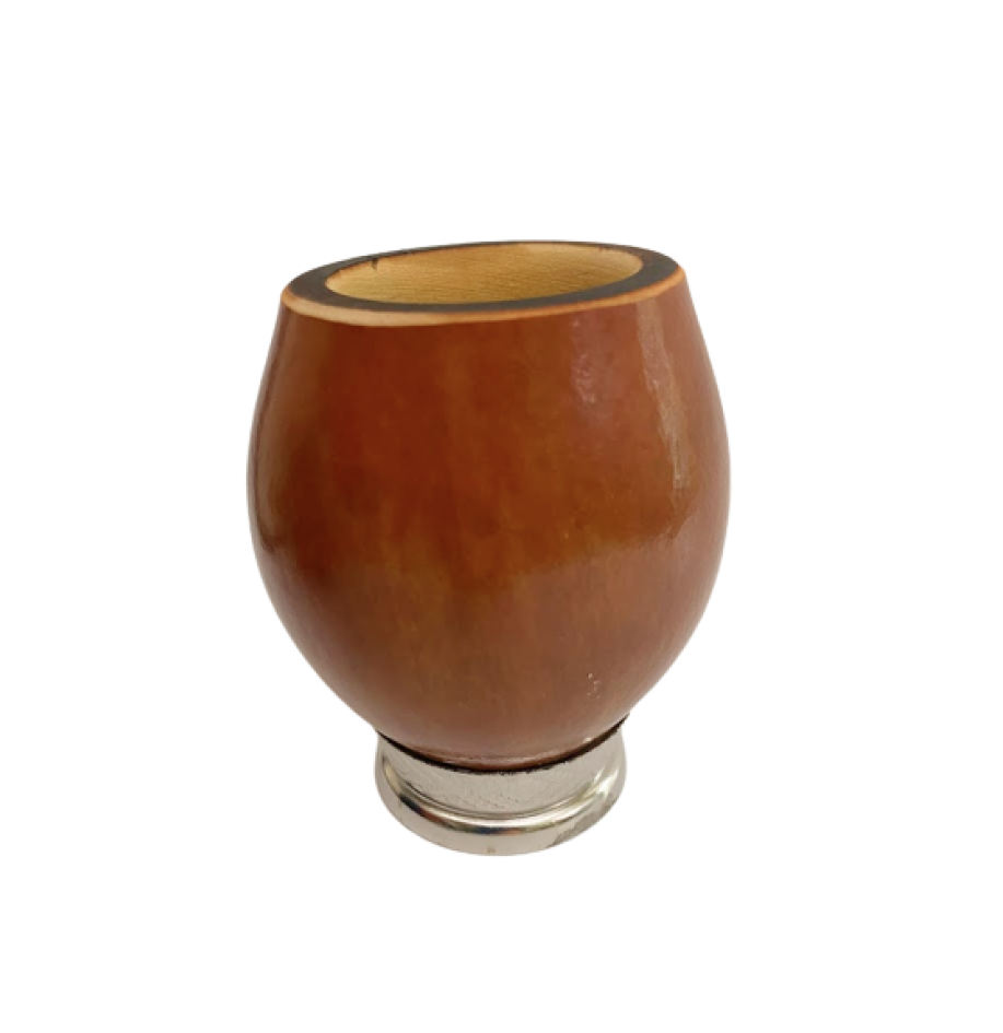 Yerba mate gourd with a metal base at bottom with a white background.