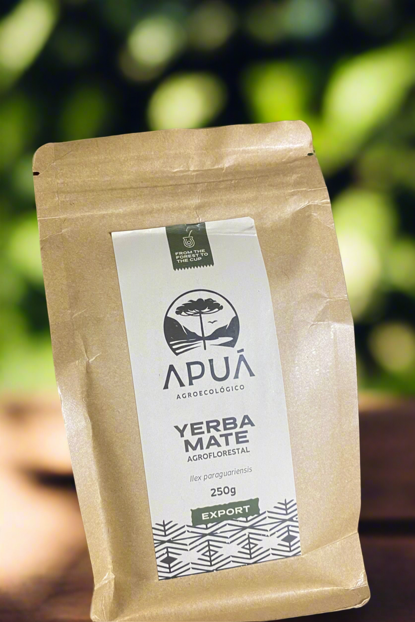 Package of Apua Yerba Mate with a blurred green background